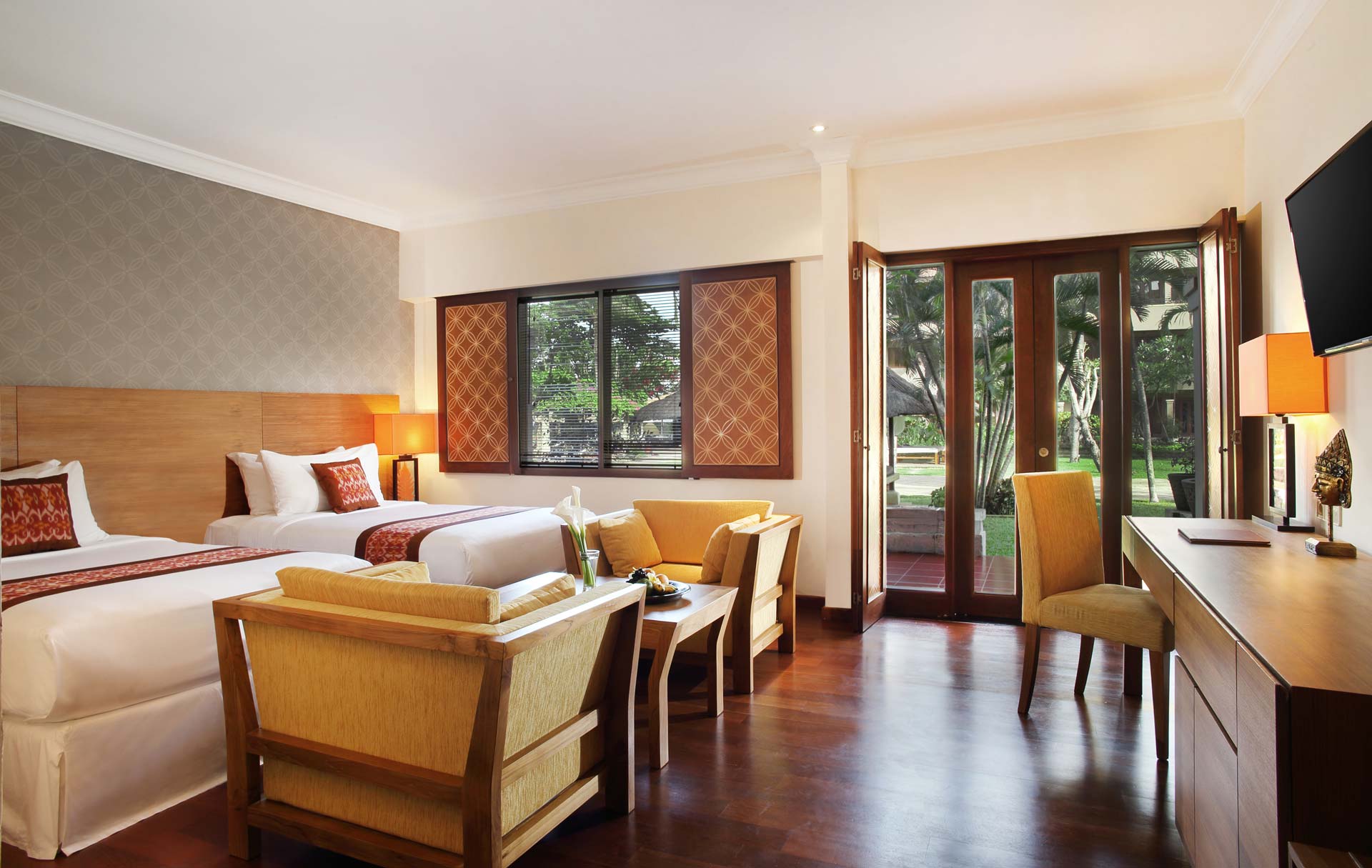 deluxe room with garden view at hotel nikko beach nusa dua